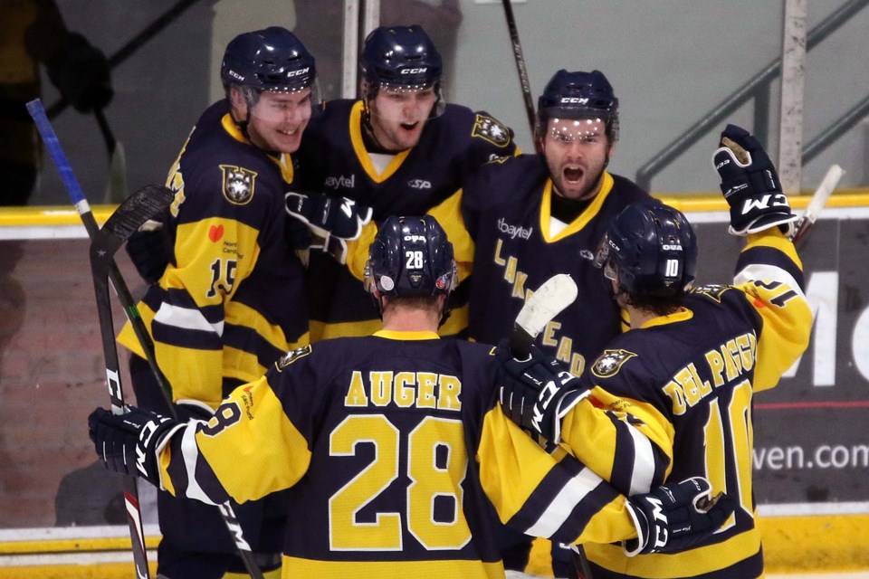 Josh Laframboise (top left) celebrates his playoff-clinching goal on Friday, Feb. 7, 2020 with teammates Tomas Soustal, Jordan Larson, Kyle Auger and Daniel Del Paggio. (Leith Dunick, tbnewswatch.com)