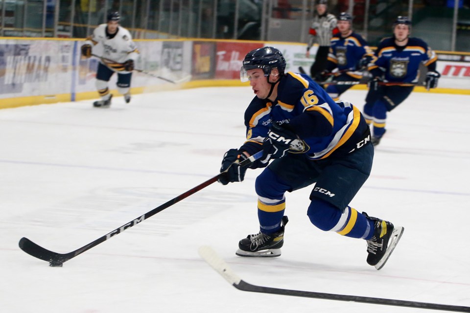 Lakehead's Spencer Blackwell had an assist on the Thunderwolves first of six goals against the Windsor Lancers on Thursday, Dec. 29, 2022 at Fort William Gardens. (Leith Dunick, tbnewswatch.com)