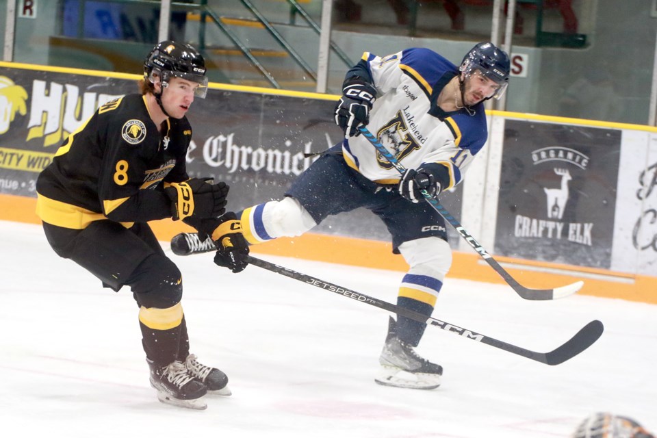 Lakehead rookie Nick DeGrazia fires the puck past Waterloo's Payton Robinson on Friday, Oct. 13, 2023 at Fort William Gardens. (Leith Dunick, tbnewswatch.com)