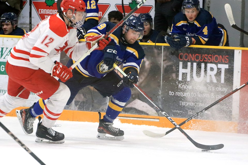 Lakehead's Justin Paul skates past York's David Mabey (left). Paul scored twice to lead Lakehead past the Lions 4-3 on Friday, Jan. 3, 2025. (Leith Dunick, tbnewswatch.com)