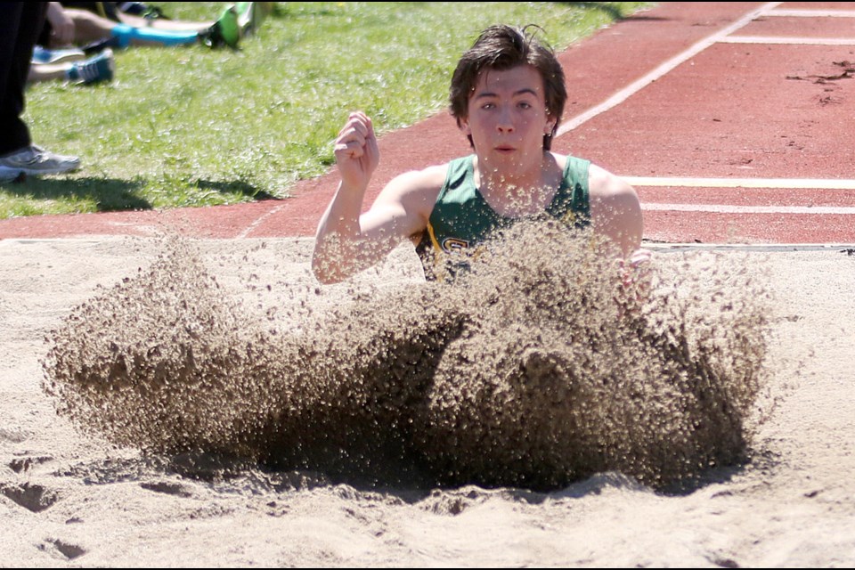 A St, Patrick student hits the sand in the long jump competition on Wednesday, May 24, 2017 at the NWOSSA track and field championships at Fort William Stadium (Leith Dunick, tbnewswatch.com). 