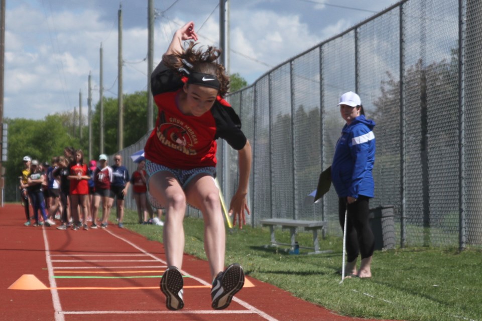 Sara Clouthier performing in the triple jump. (Michael Charlebois, tbnewswatch)
