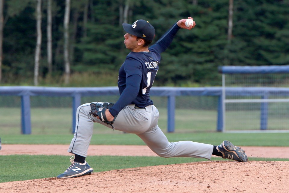 The Lakers Adam Tassone pitches on Sunday, Aug. 6, 2023, in a warm-up for the 2023 Pool A WBSC Women's Baseball World Cup qualifier against Team Canada. (Leith Dunick, tbnewswatch.com)