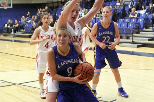 Lakehead guard Katie Ulakovic tries to outmuscle York's Taylor Ross Saturday night at the Thunderdome.  (Leith Dunick, tbnewswatch.com)