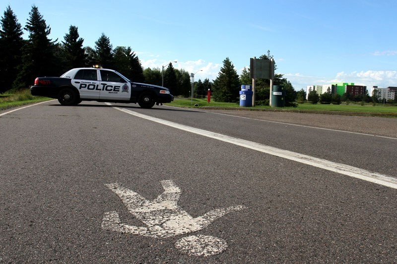 Police holding the scene in Chapples Park on Sept. 3, 2014 where William Wapoose's body was found. (File). 