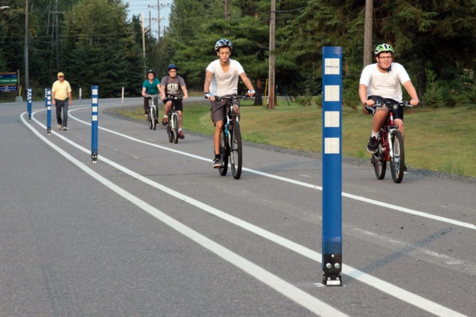 Cyclists and pedestrians enjoy a multi-use trail along Arundel Street. (File photo)