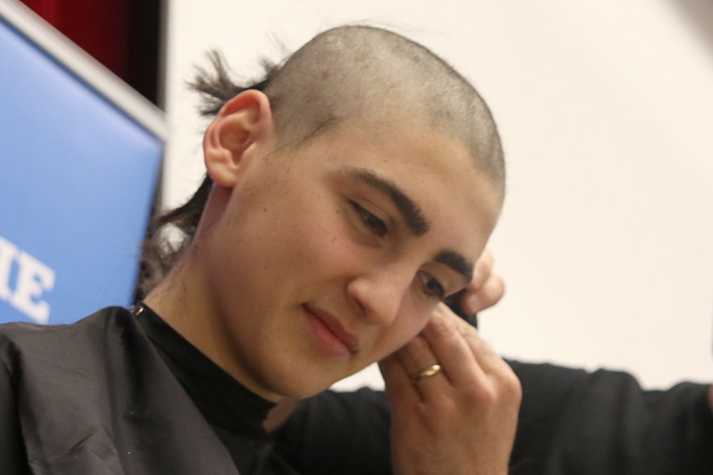 High school student grows, cuts hair in honour of friend stricken with cancer High school student grows, cuts hair in honour of friend stricken with cancer