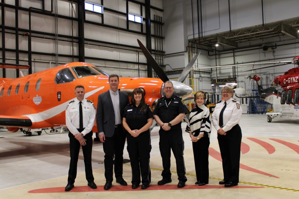 Wade Durham, the Chief Operating Officer at Ornge; Shane Strickland, the Dean of the School of Health, Negahneewin and Community Services at Confederation College; Tanis Miller, the college's program coordinator for the Advanced Care Paramedic program; Rob Plummer, the college's program coordinator for the Primary Care Paramedic program; Pat Lang, Board of Directors member at Ornge, and Sandra Sutherland-Byers, the Thunder Bay Base Manager for Ornge, stand together, left to right, at the award announcement on Dec. 12. (Submitted)