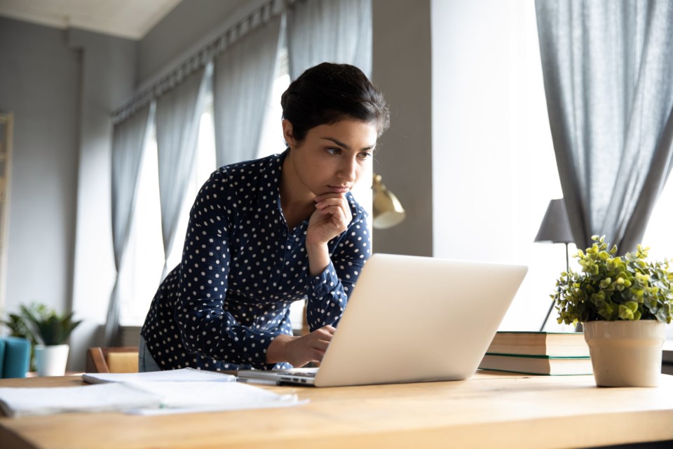 Thoughtful,Serious,Young,Indian,Ethnic,Woman,Student,Freelancer,Working,Studying