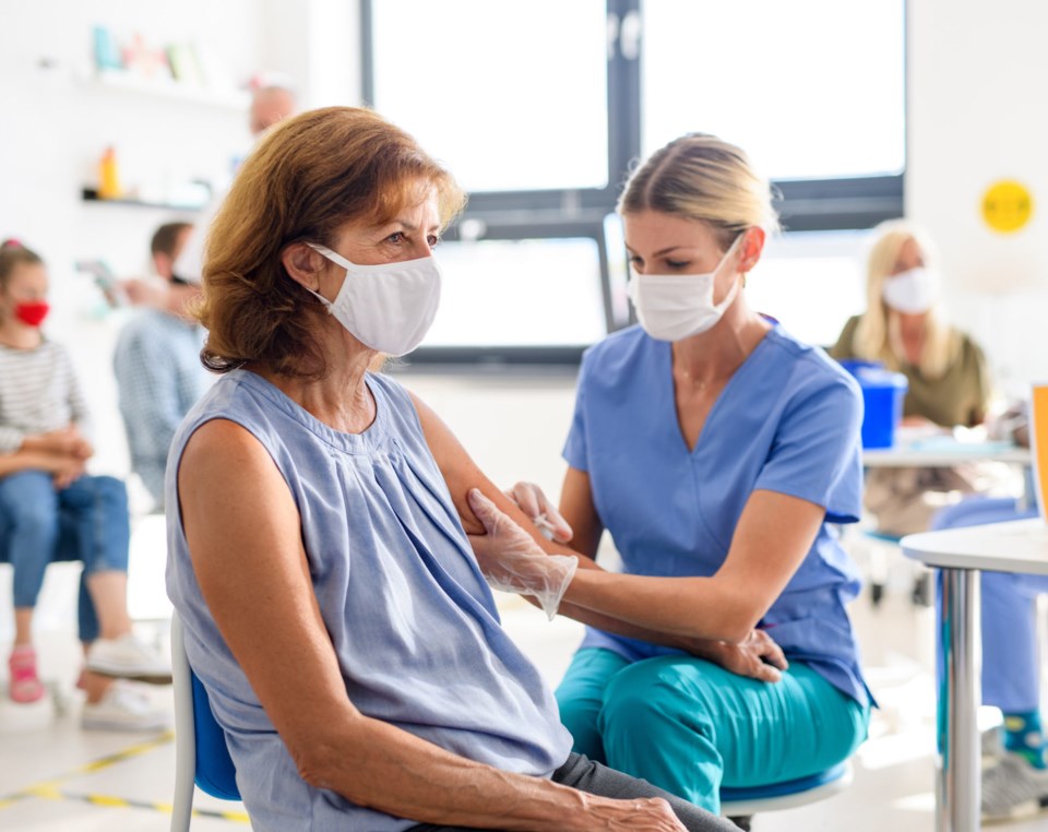 Woman,With,Face,Mask,Getting,Vaccinated,,Coronavirus,,Covid-19,And,Vaccination