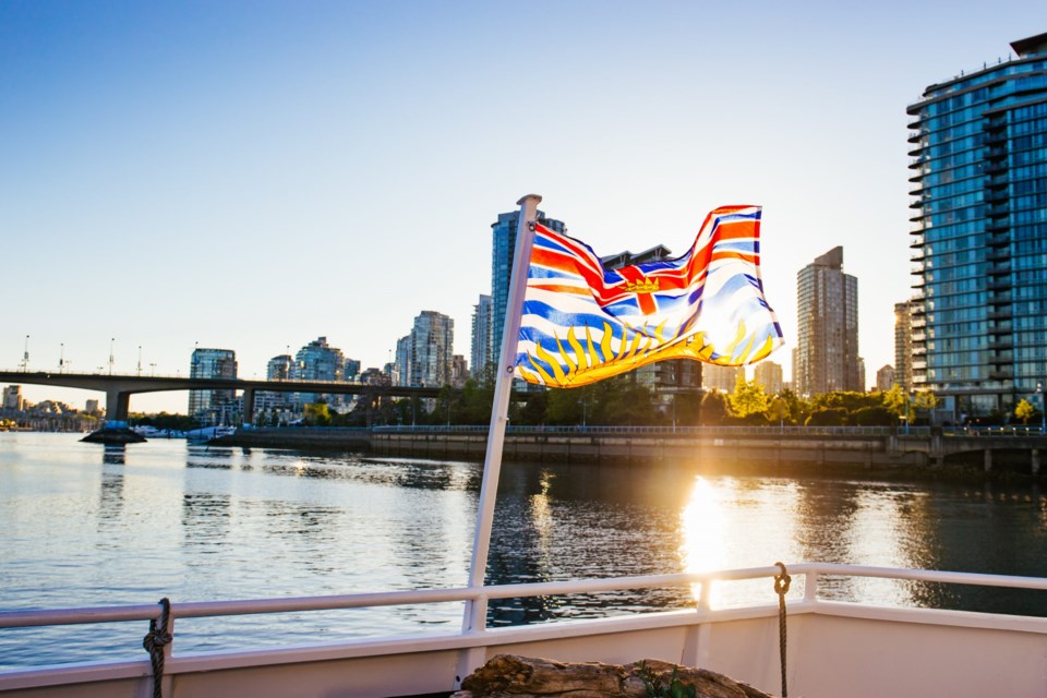 The,Beautiful,British,Columbia,Flag,In,Front,Of,Downtown,Vancouver