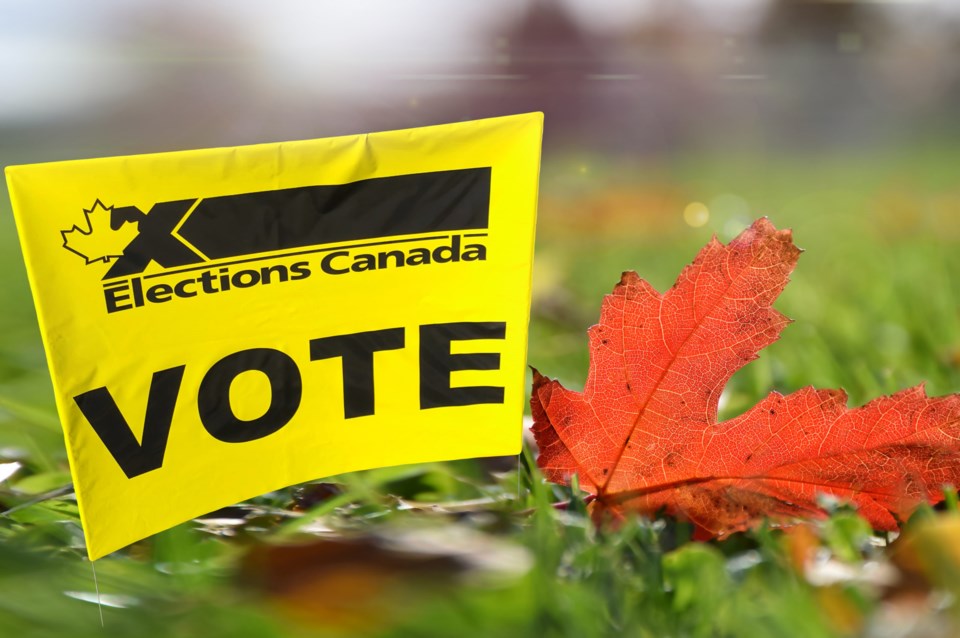 Elections,Canada,Vote,Sign,With,Red,Maple,Leaf,On,Green