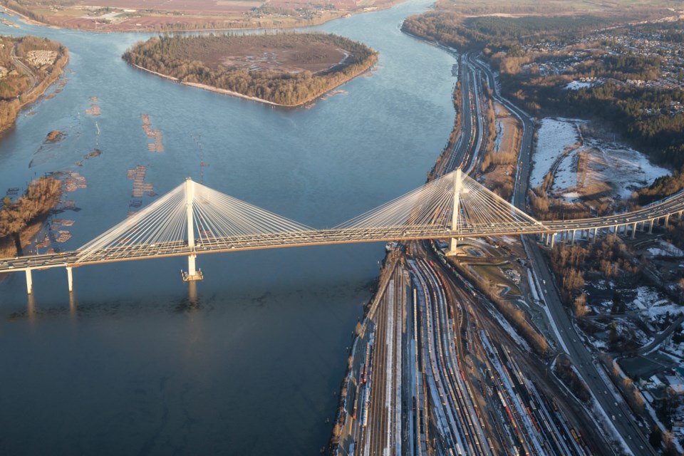 Aerial,View,Of,Fraser,River,And,Port,Mann,Bridge,During