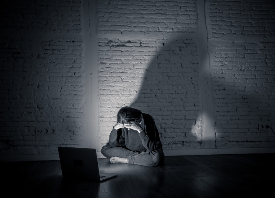 Sad,And,Scared,Female,Young,Woman,With,Computer,Laptop,Suffering