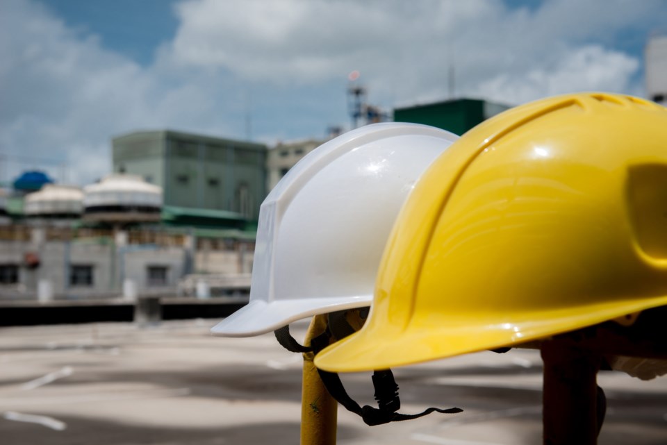 White,And,Yellow,Hard,Safety,Helmet,Hat,In,Industrial,Plant