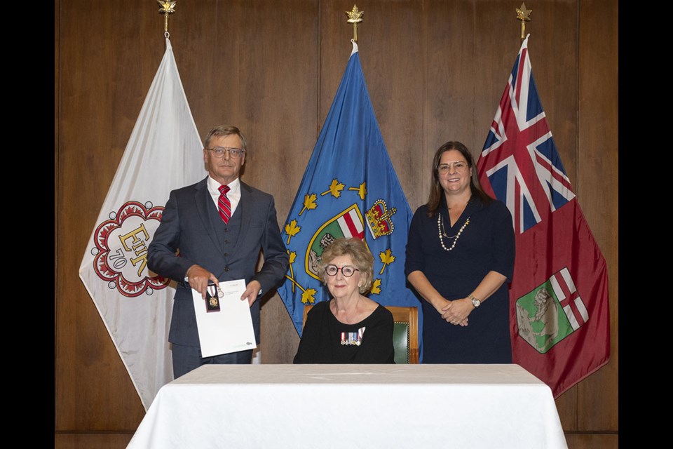 University College of the North president Doug Lauvstad at a Sept. 26 ceremony with Manitoba. Lt.-Gov. Janice Filmon and Premier Heather Stefanson during which he received a Queen Elizabeth II Platinum Jubilee Medal.