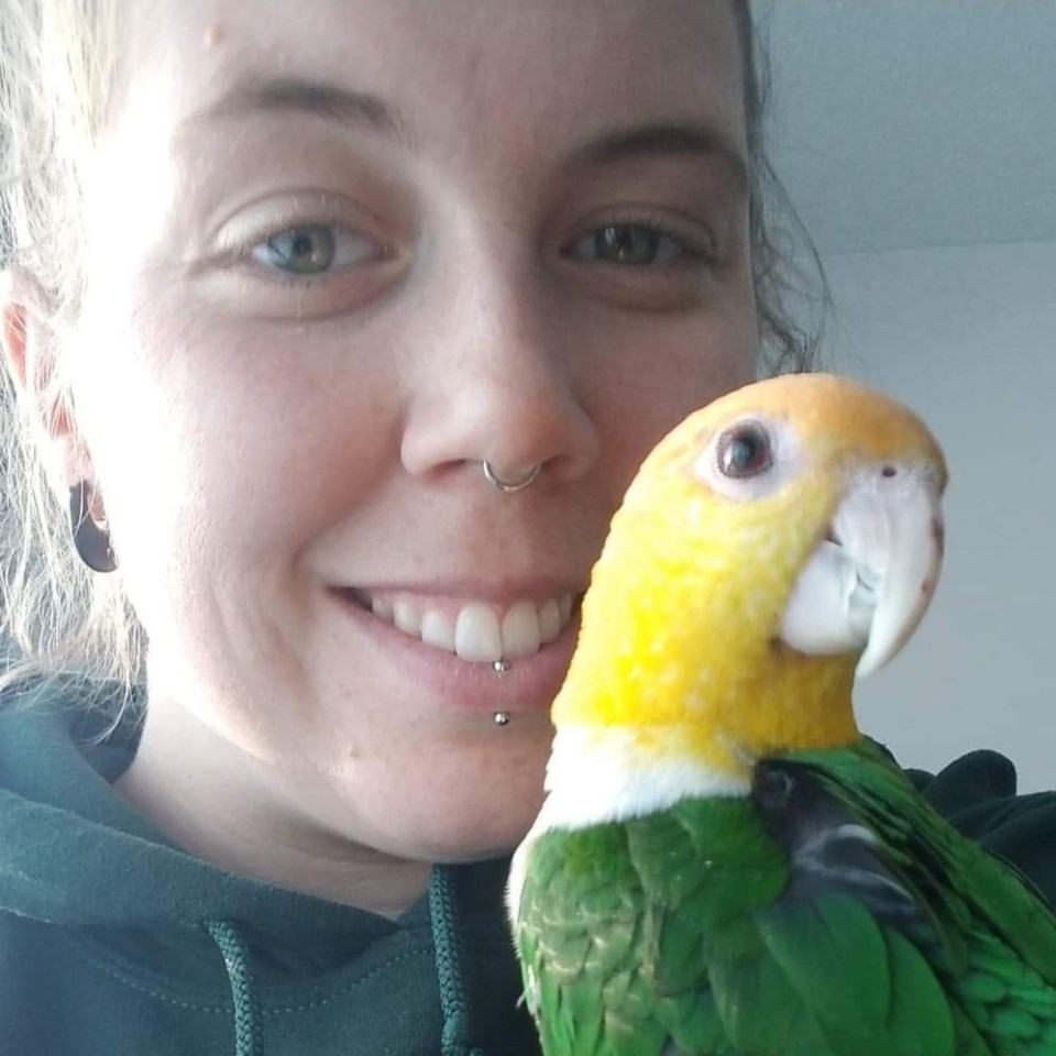 rtam bursary recipient cassie palidwor and her pet bird fiona