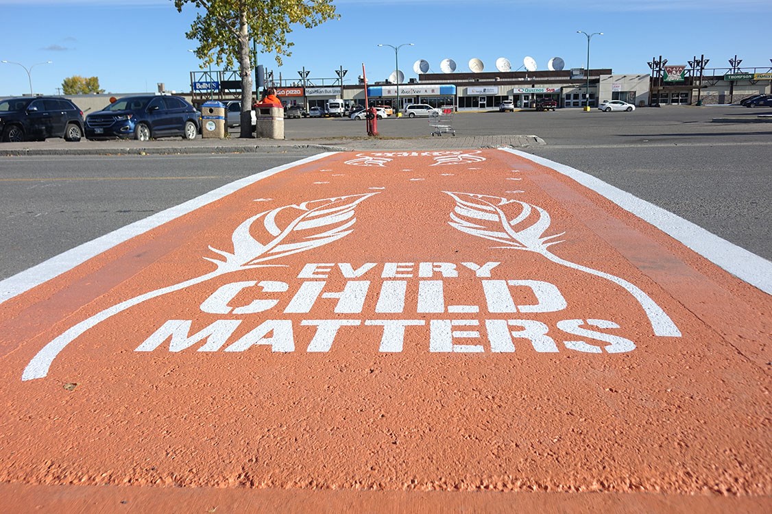 Selkirk Avenue crosswalk painted orange for Truth and Reconciliation Day
