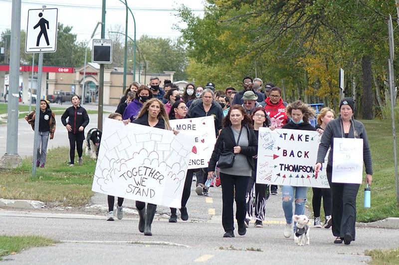 Dozens of Thompsonites took to the streets Sept. 18 to express their frustration with recent violent incidents and crime in the community.