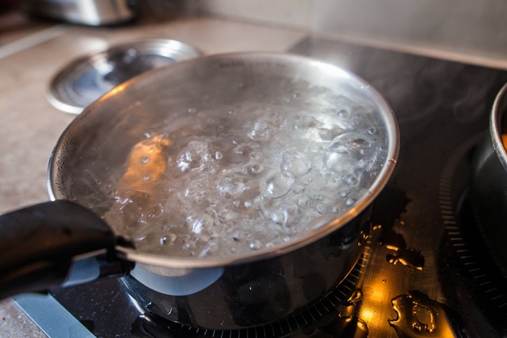 pot of boiling water on stove by Capelle.r Getty Images