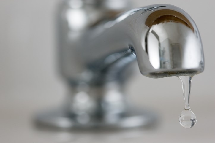 water dripping from tap stock photo tim graham getty images