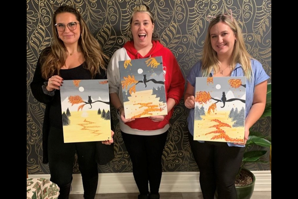 Ash Kandas (middle) started ALK Artwork in January 2020 to teach others how to paint.