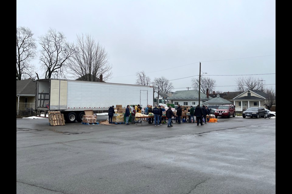 On Saturday afternoon, the community came together for a free food giveaway in the parking lot of the Holy Rosary Church in downtown Thorold.