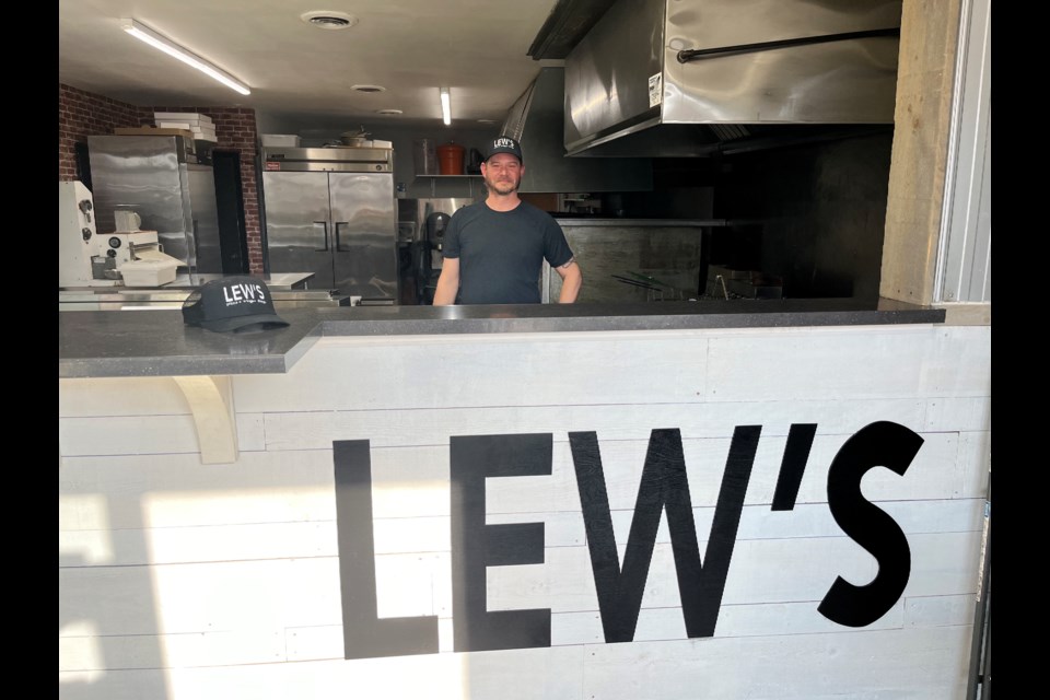 Aaron D'Eon and his partner Kristen Dalton are set open Lew's Pizza + Wings + Things tomorrow morning.