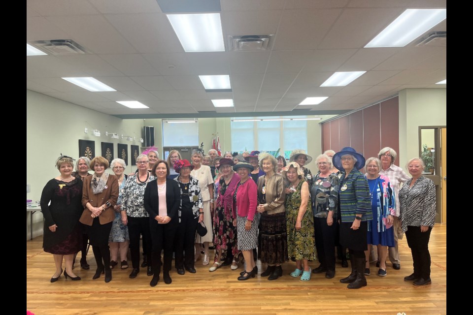 The St. Catharines and District Newcomers Club celebrated its 45th anniversary on Saturday. National President Suzanne Brett-Welsh is standing on the far left, and the president of the St. Catharines Chapter Jeanette Liberty-Duns is standing fourth from right.