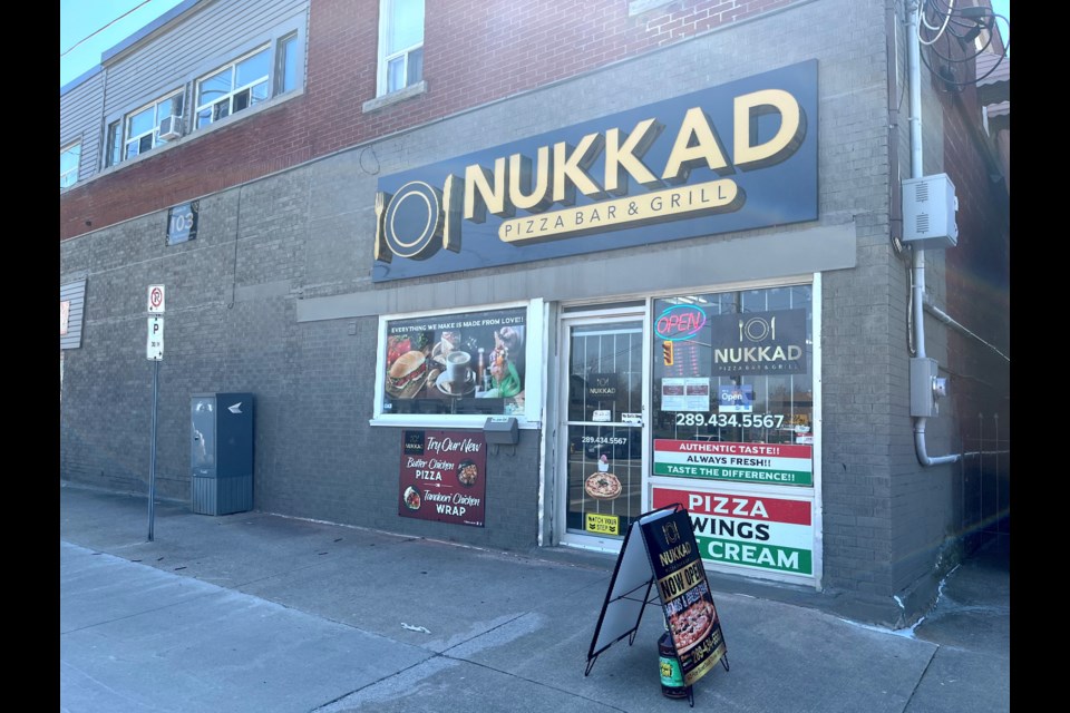 Nukkad Pizza, Bar, and Grill specializes in pizzas infused with Indian flavours.