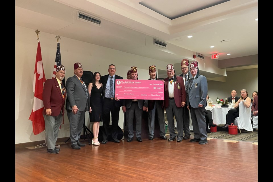 On Wednesday night the Giffords handed over a $5,000 cheque to the St. Catharines Shrine Club.