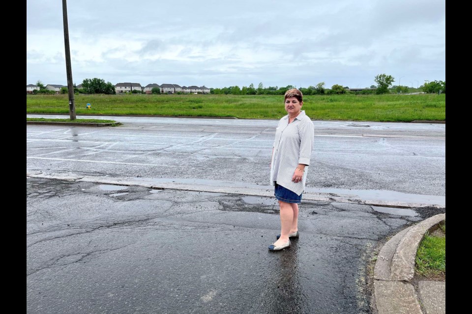 Silvana Lagrotteria says the corner of Collier Road and Confederation Avenue has been sitting empty since she moved there in the 1980s. “How many times do I have to drive by that sign and nothing gets developed?" she asks. "The promise was that we would have something on this end of town.”