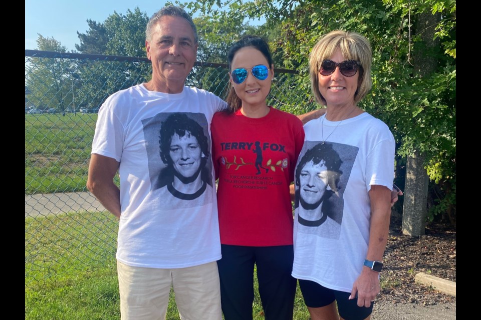 Cindy Dickson (r) with her daughter Candace (m) and her husband Jim (l)