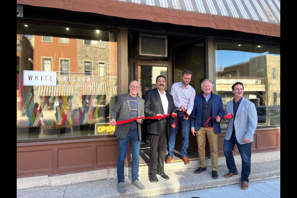 Gallery owner Patrick Pietruszko cut the ribbon, together with Councillor Tim O'Hare, BIA Chair Serge Carpino, Mayor Terry Ugulini and Councillor Mike De Divitiis.