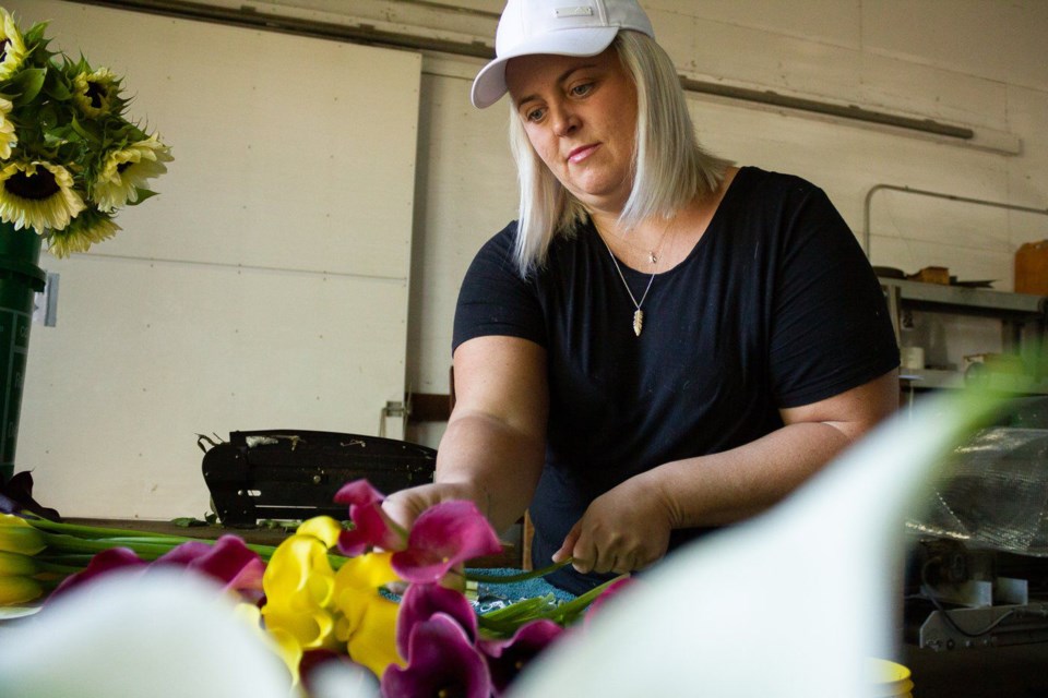 Amy Marconi, owner of Be Fresh Flowers arranges calla lillies for a subscription order on August 20, 2020.
Jordan Snobelen/Torstar