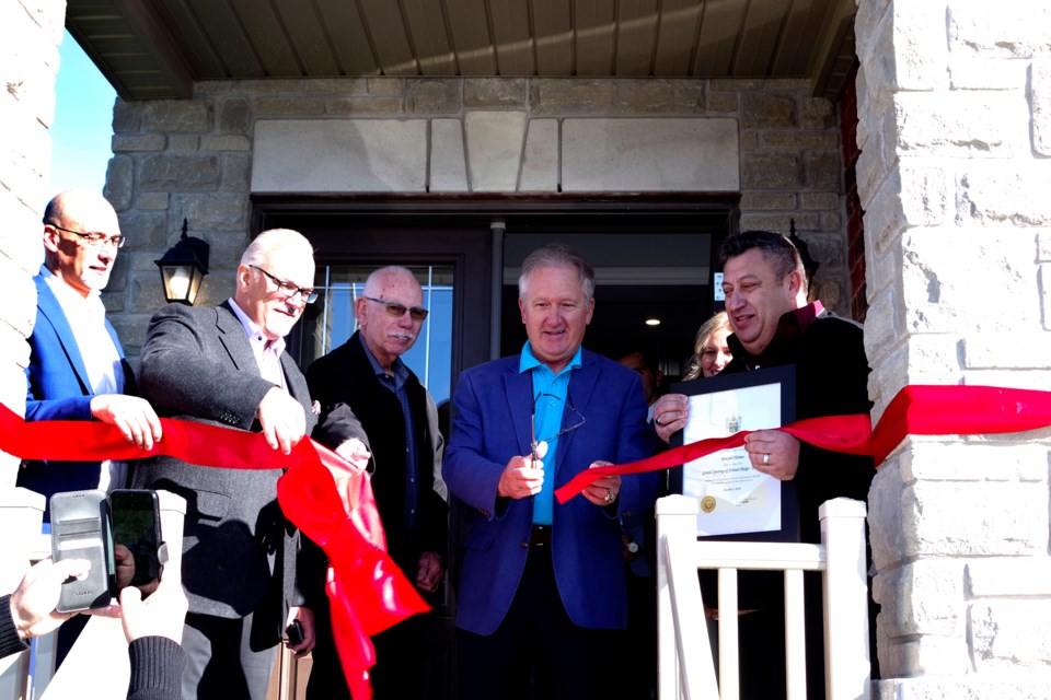 A ribbon-cutting launched phase 2 of Artisan Homes development. Pictured (l-r) are Tony DiFruscio and Daniel Odorico, from Downing Street brownfield specialists, Coun. Fred Neale, Mayor Terry Ugulini, Brandi Bermuhler, sales for Marydel Homes and McGarr Realty and Marydel president Vito Montesano. Bob Liddycoat / Thorold News