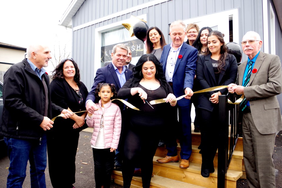 Officials and supporters joined Micaela Borelli in cutting the ribbon on her new business. Bob Liddycoat / Thorold News