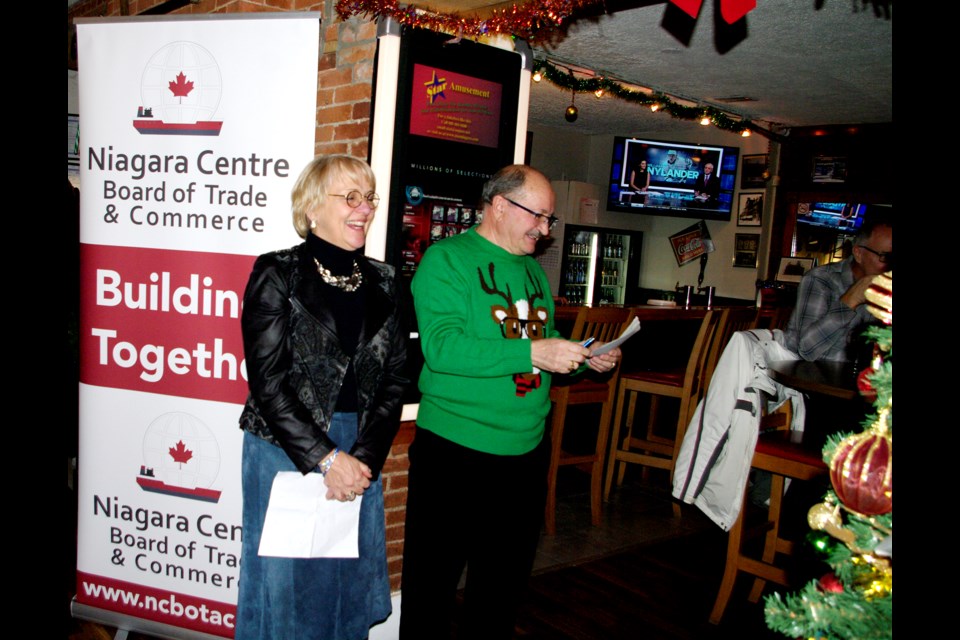 Co-hosts Sue Morin (l) Thorold's Tourism agent, and John D'Amico, president of NCBOTAC greeted business leaders at the annual Christmas business after 5. Bob Liddycoat/Thorold News