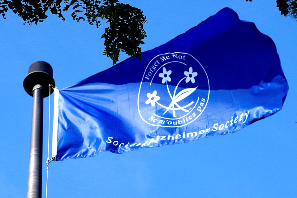 The trademark blue Alzheimer Society flag flies above Regional Headquarters to mark World Alzheimer Day. Bob Liddycoat / Thorold News