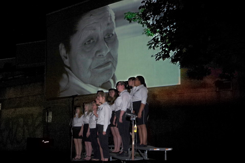 Video played while choir performed original score from Josh Kalogerakos. Bob Liddycoat / Thorold News