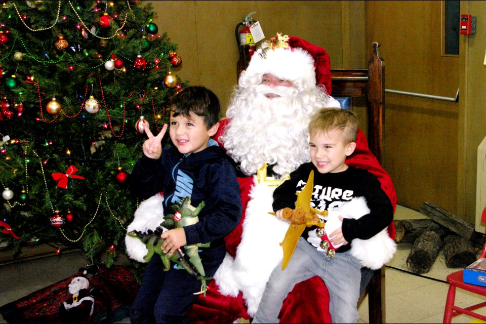 Ryder Scarbo (left) and Liam Scarbo from Thorold enjoyed the Lions Club Santa Breakfast at St. Andrews Church Saturday. Bob Liddycoat/ThoroldNews