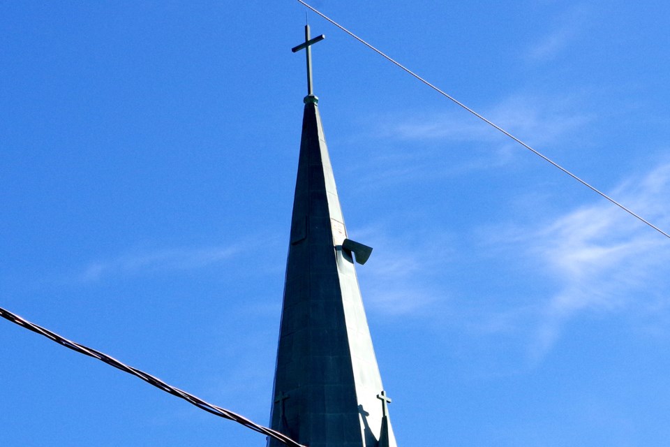 Copper sheet hanging from steeple was creating a hazard below. Bob Liddycoat / Thorold News