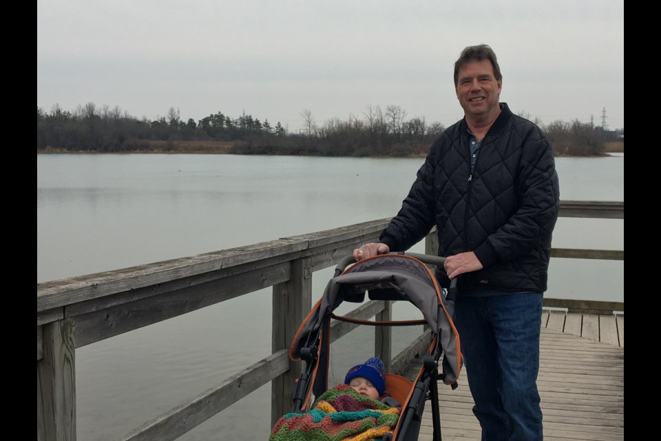 John Haanappel out for a walk with his grandson Clark, who is completely unaware of the ongoing pandemic. Photo: Ludvig Drevfjall, Thorold News