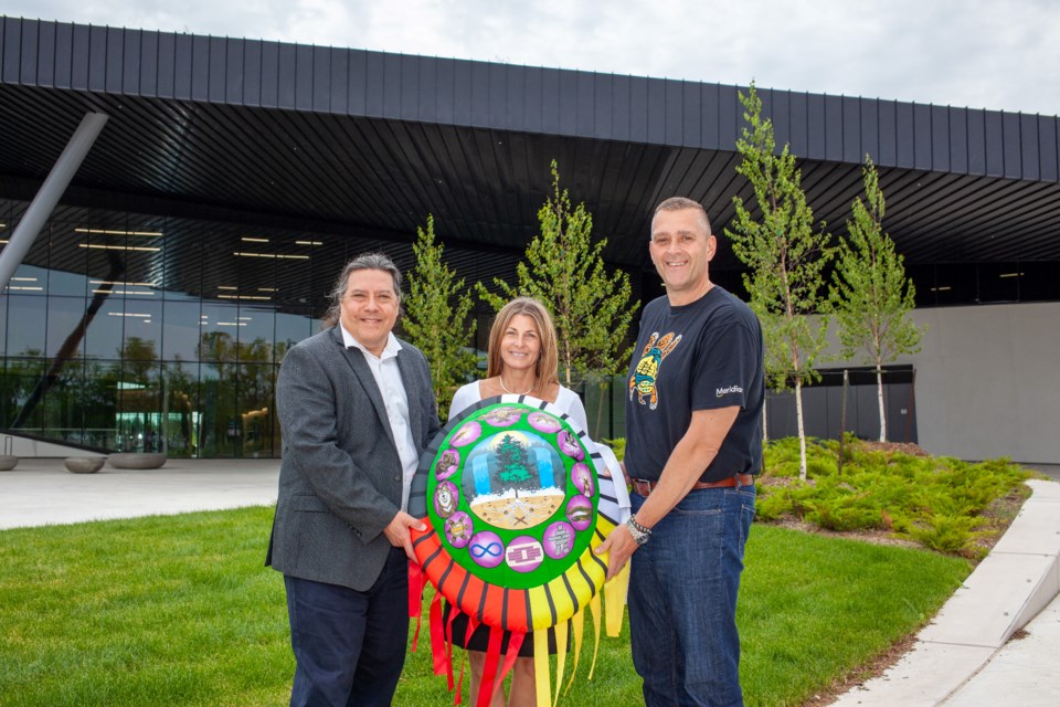 Rick Anderson, Michele-Elise Burnett & Wade Stayzer pose for a photo in celebration of Niagara College & Meridian supporting Indigenous programming at N22 CSGs (Credit - James Ruddy)