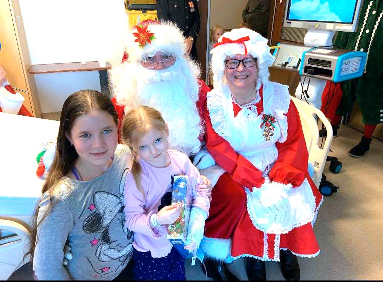 Santa and Mrs. Claus with kids in pediatrics at the St. Catharines Hospital. Submitted Photo
