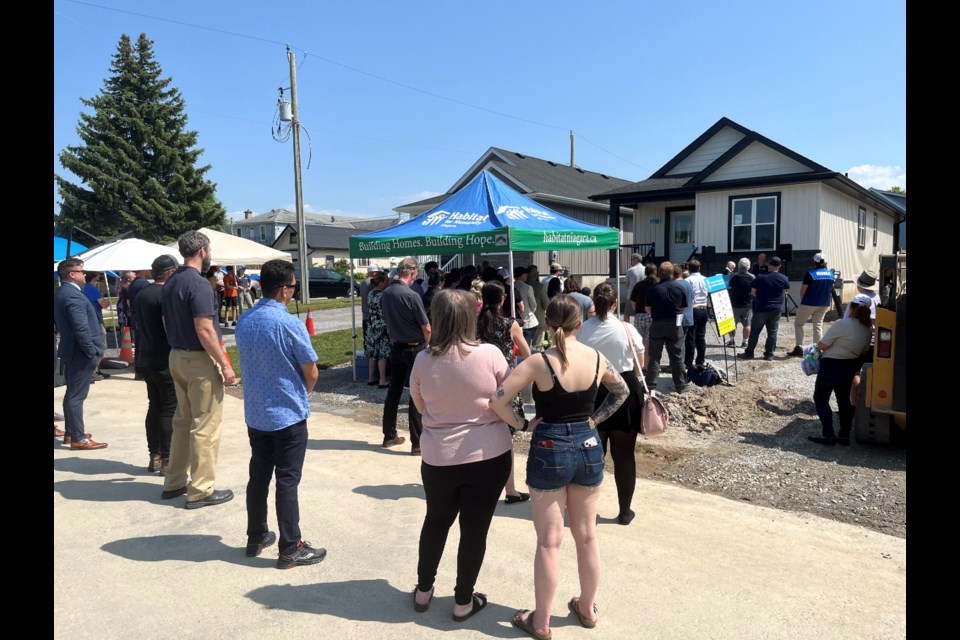 It was a joyous Thursday afternoon as two families were given the keys to their new Habitat for Humanity homes in Thorold South.