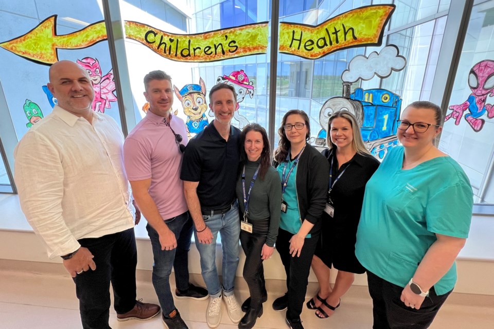 From left: Paul Matteis RMHC SCO Board Chair), Michael Kemp (Past Chair), Mario De Divitiis (CEO, RMHSCO), Krista Unruh (Niagara Health Charge Technologist), Tania Penner (Lab Technologist), Kristin Provenzano, (Administrative Assistant, Pathology/Lab), and Cheryl Fryer-Wasielewski (Lab Technologist).