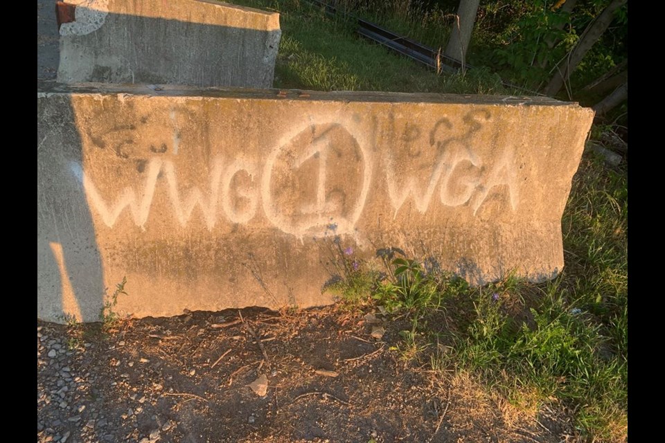 Several locations have been spraypainted with messaging pertaining to the conspiracy theory known as 'Qanon'. Photo: Supplied