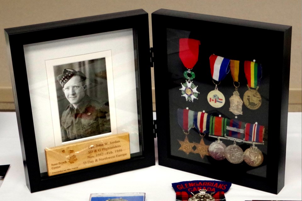Photos of a young John Jordan in uniform and his medals. Bob Liddycoat / Thorold News