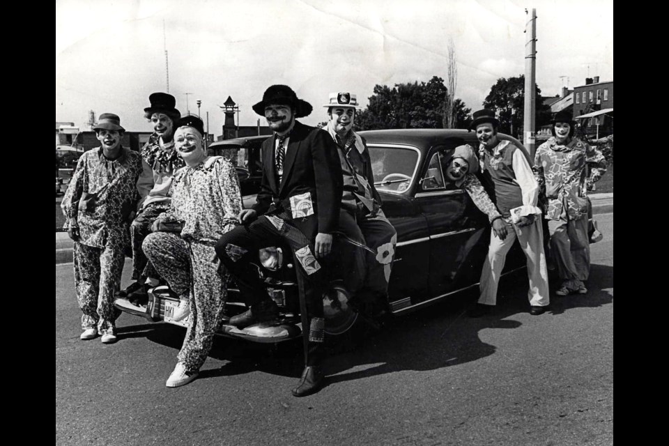 This photo, circa 1975, includes (l-r) Pierre Truchon, unknown, Barney Potts, Dave Hill, Lou Silvello, Peter Panicale Jr., Leno Mauro, and Mike Meloche. All the costumes were made by Claudette Meloche. Photo / Andy Stephens Collection